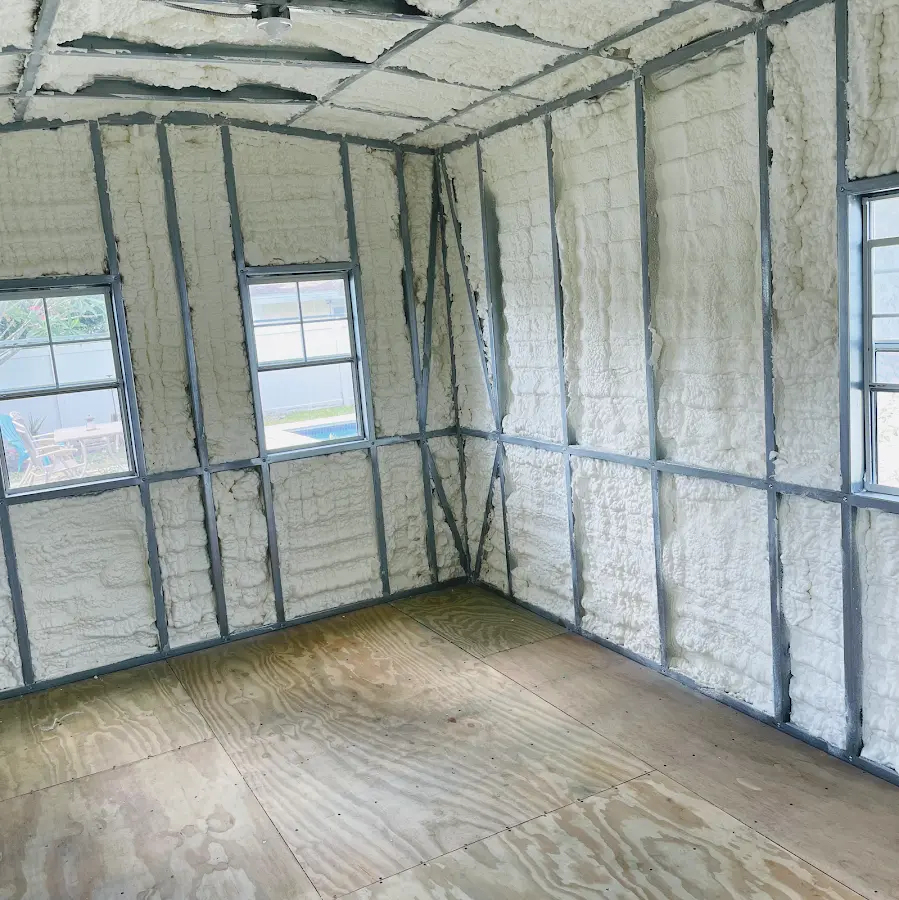 Closed-cell spray foam insulation applied to wall cavities in a residential project in South Apopka